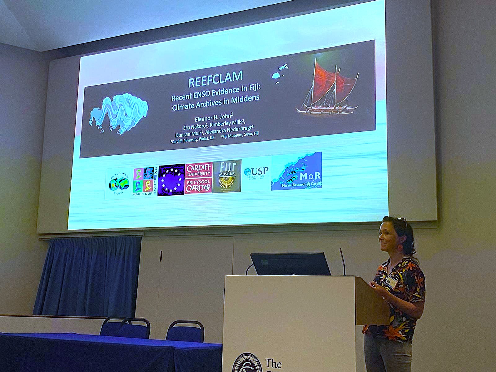Eleanor John giving a talk at PACS2023