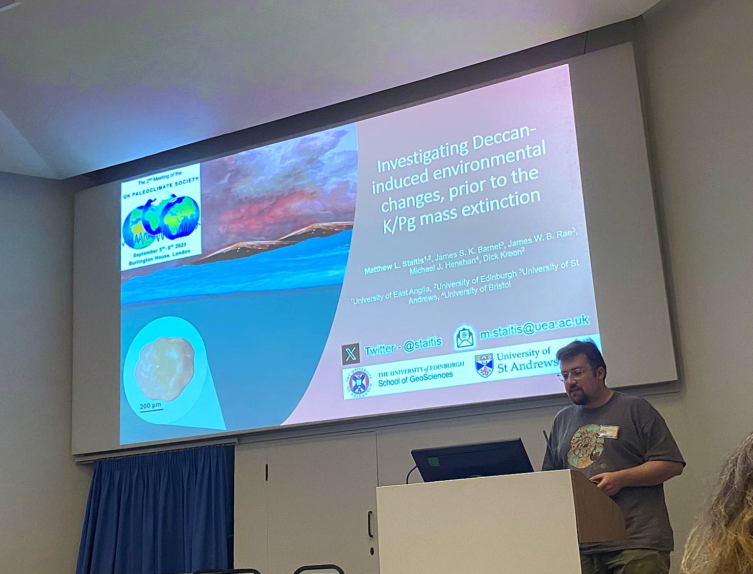 Matthew giving a talk at PACS2023
